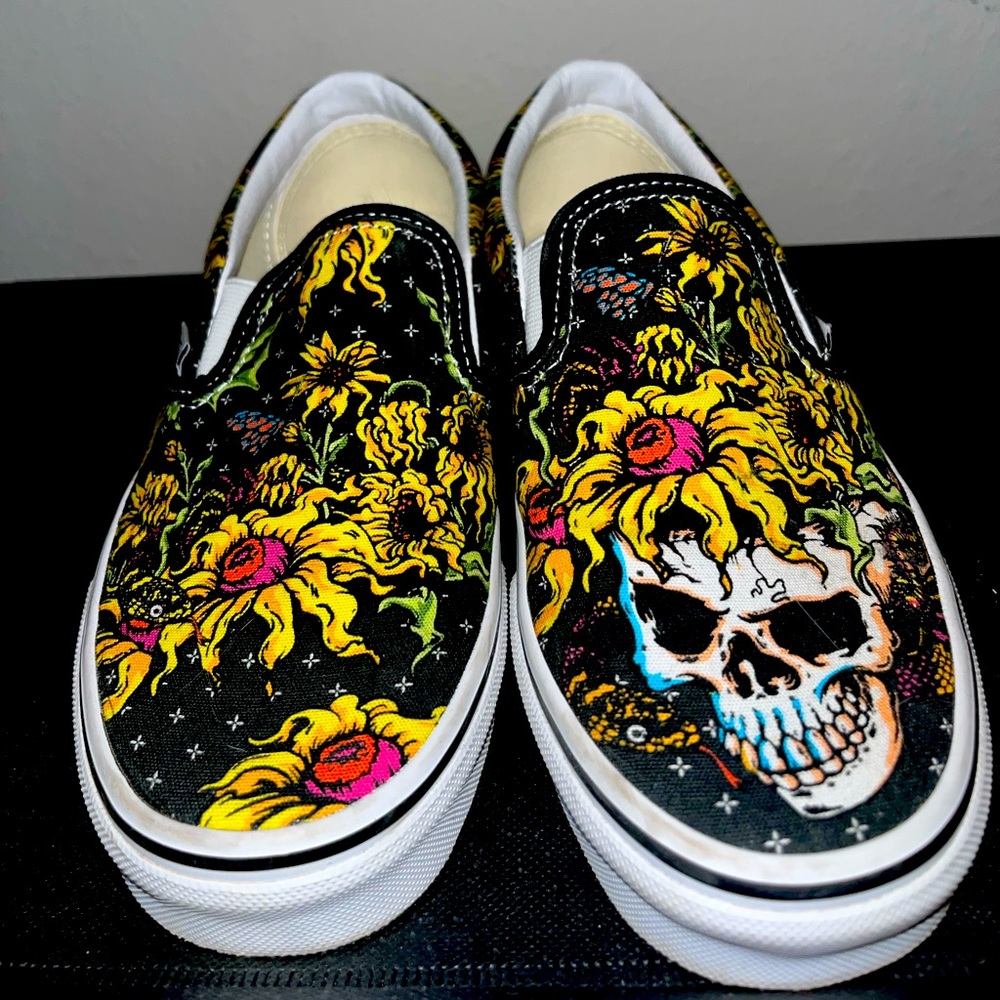 Vans slip ons with skull flower design
